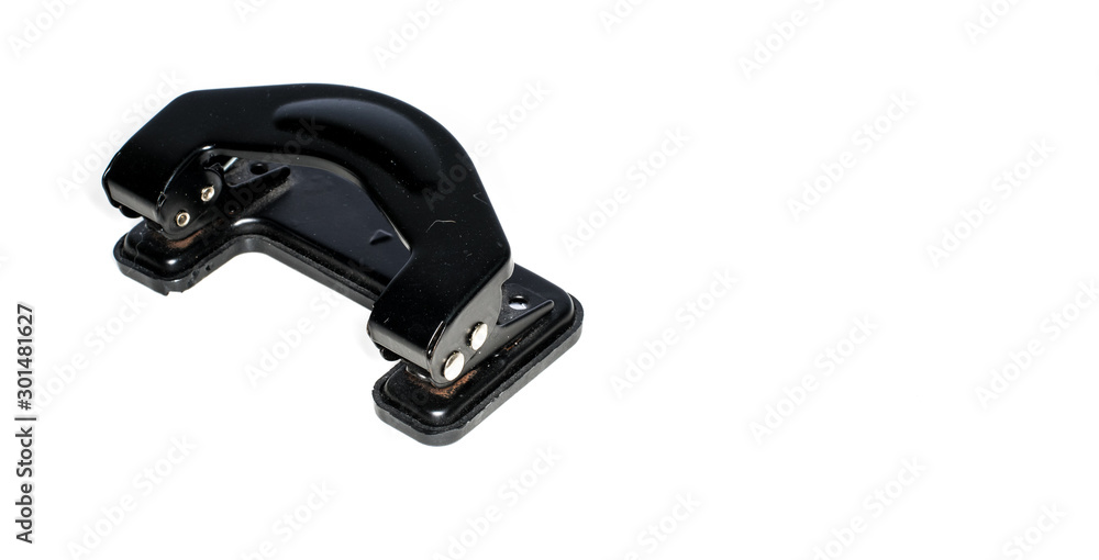 Old and dirty hole punch isolated on the white background. Office equipment concept. Old and dirty hole punch isolated on the white background. Office equipment concept.