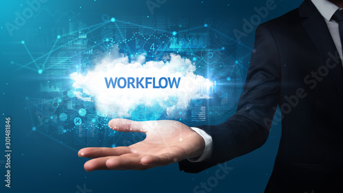 Wallpaper Mural Hand of Businessman holding WORKFLOW inscription, successful business concept Torontodigital.ca