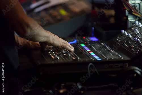 Obraz na płótnie Console controller hand working during theatre play