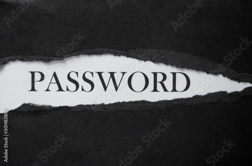 Word password printed on a white background with black torn paper.