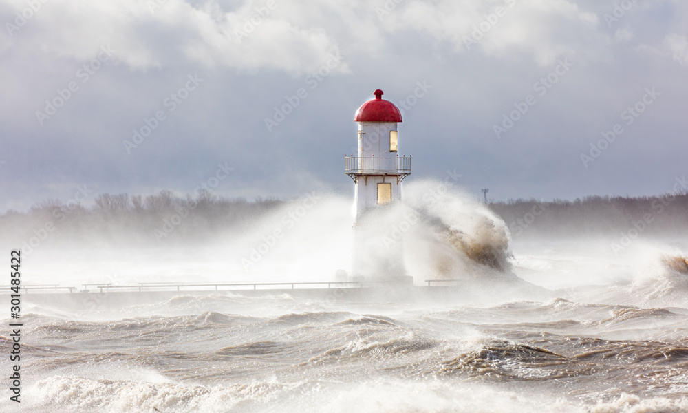 Lachine lighthouse being battered by a storm in early November, Quebec, Canada.