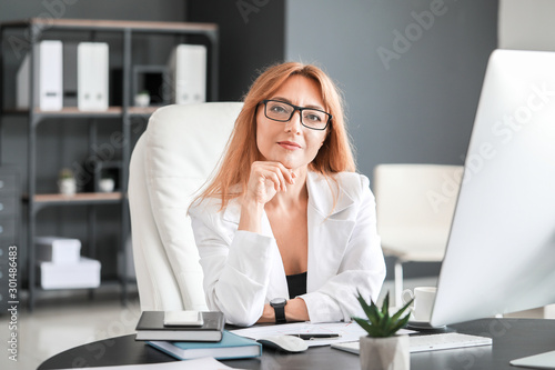 Portrait of mature businesswoman in office