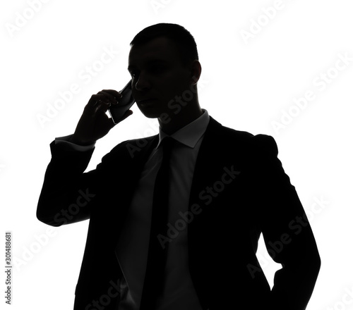 Silhouette of handsome busi...