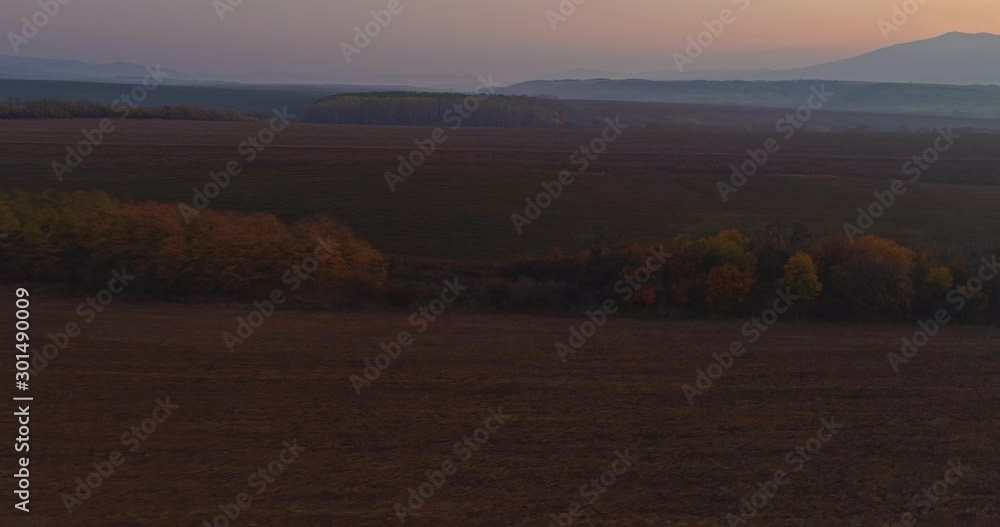 Aerial drone fly over northern Hungarian landscape at sunrise. Northern Matra mountains and hills. Aerial drone fly over northern Hungarian landscape at sunrise. Northern Matra mountains and hills.