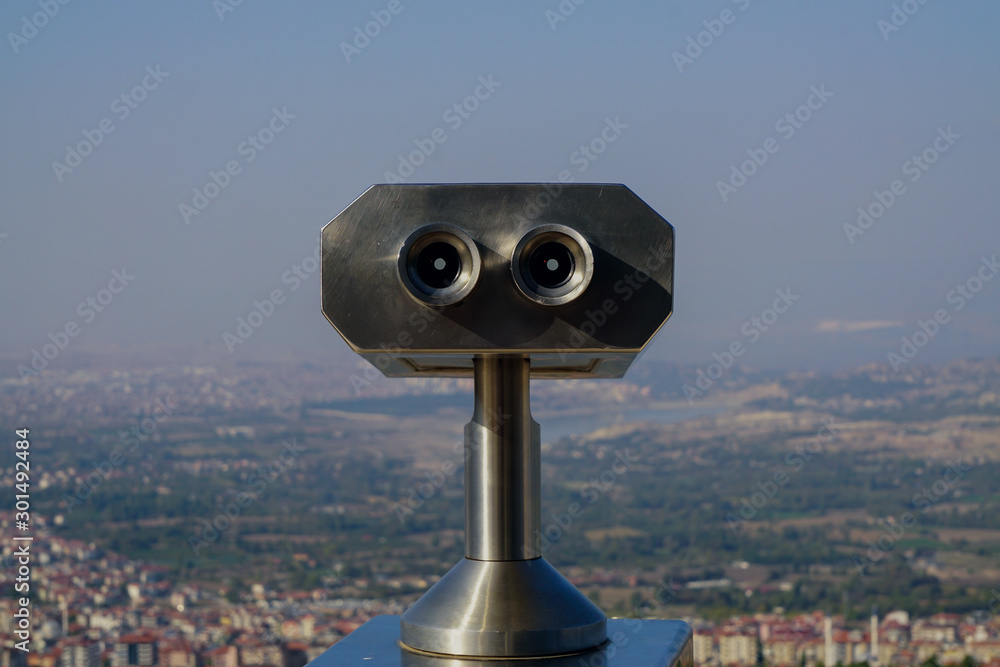 Sightseeing scenic binoculars with denizli city scene