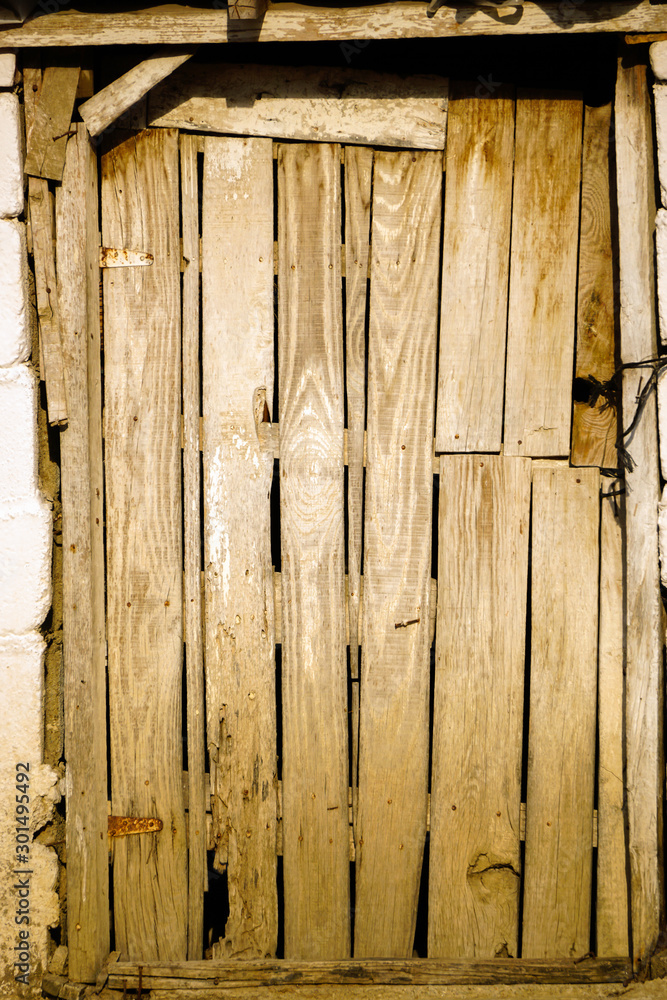 Antique wooden door of the village house