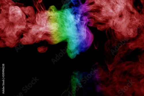 Abstract smoke isolated on black background Rainbow powder