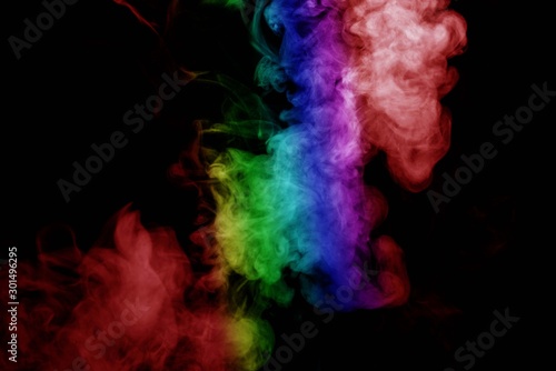 Abstract smoke isolated on black background Rainbow powder