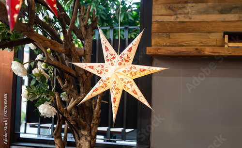 Paper stars hanging for holiday season