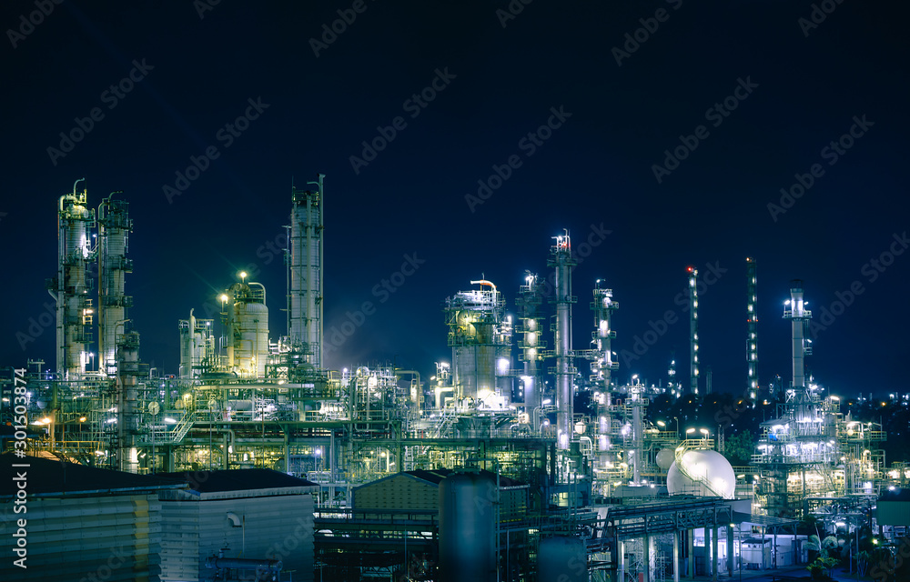 Glitter lighting of petrochemical plant with night, Manufacturing of petroleum industrial plant