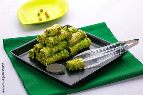 oriental pistachios baklava yabrak with pistachio paste photo