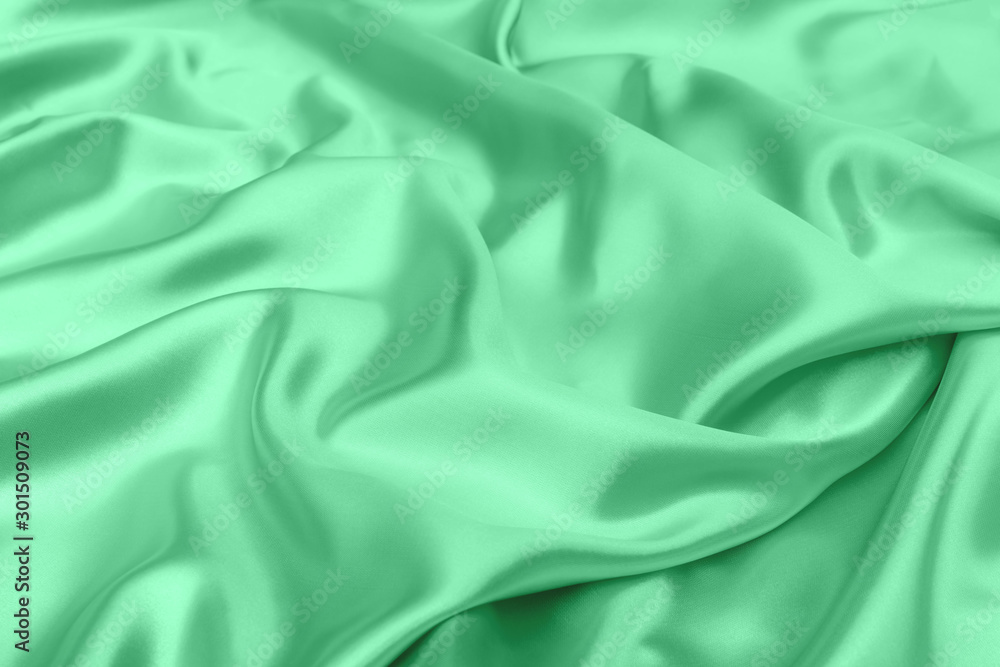 Obraz premium green satin fabric texture soft blur background