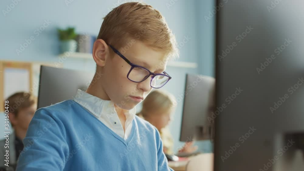 Elementary School Computer Science Classroom: Portrait of a Smart Boy ...