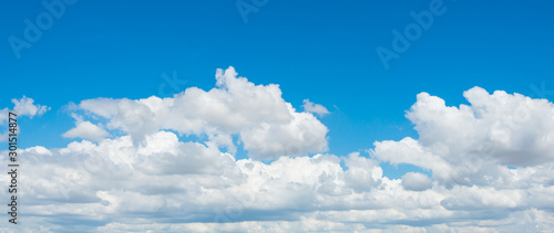 White clouds cumulus floating on blue sky for backgrounds concept, For putting text or advertising products.panorama.