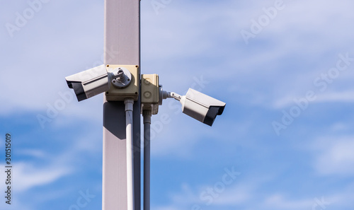 CCTV, solar panels on the pole, on the natural background, tools for safety and facilitate.