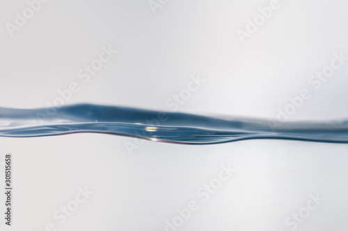 Nice abstract blue water splash on white background