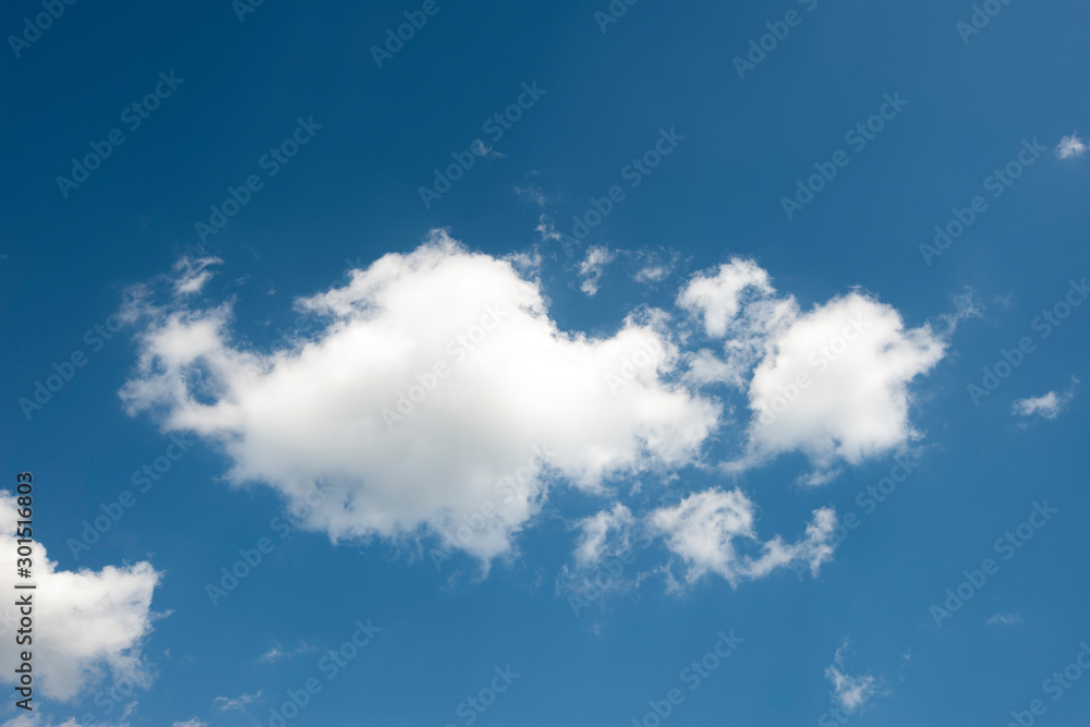 White clouds with Blue sky background.