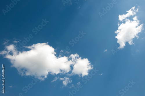 White clouds with Blue sky background.