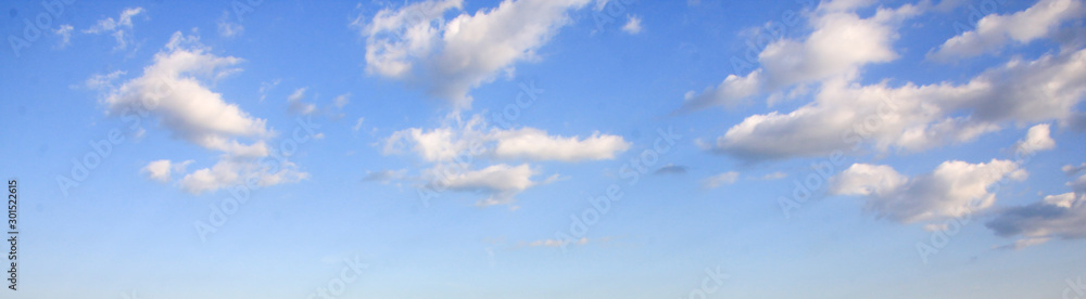 Panoramic view of blue summer sky with white clouds or cloudscape. - obrazy, fototapety, plakaty 