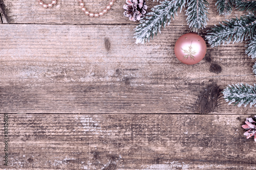 Christmas decorations on a wooden background.