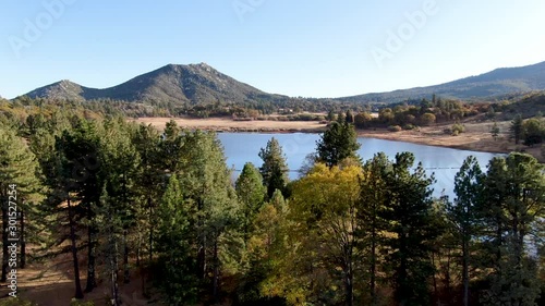 Aerial view of Lake Cuyamaca, 110 acres reservoir and a recreation area in the eastern Cuyamaca Mountains, located in eastern San Diego County, California, USA photo