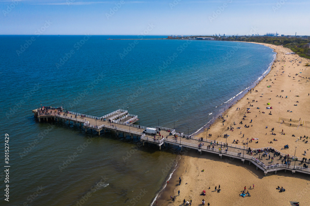 Aerial view on Gdansk Brzezno pier with many people.