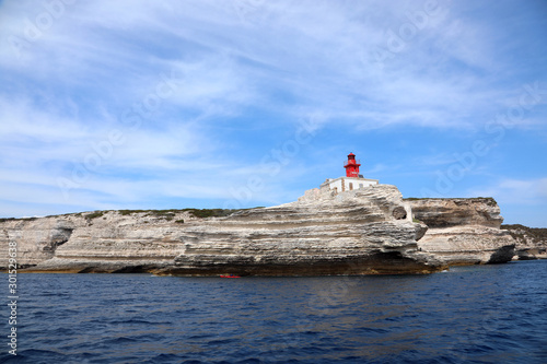 small red lighthouse near Bonifacio City in Corsica