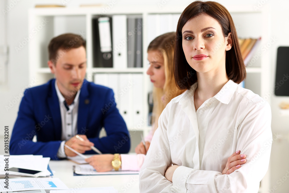 Beautiful girl at workplace look in camera Beautiful girl at workplace look in camera
