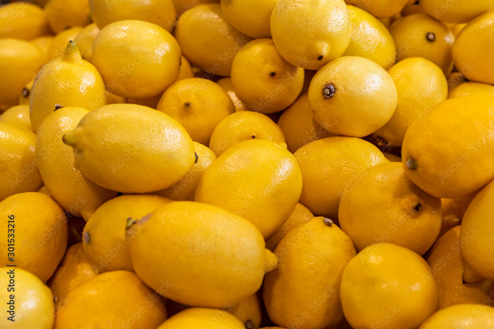 small shop. there is a yellow lemon on the window. close-up. texture.