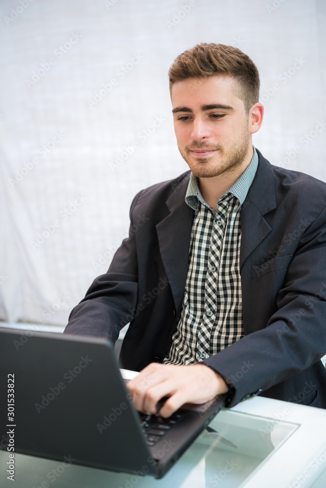 businessman working with laptop computer at coffee shop in the morning businessman working with laptop computer at coffee shop in the morning
