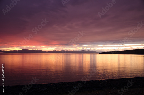 Rainy jrange red flamy sunset at Houbsougoul lake