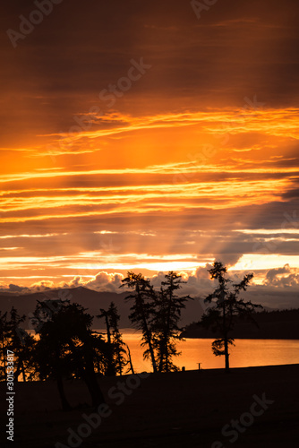 Rainy jrange red flamy sunset at Houbsougoul lake