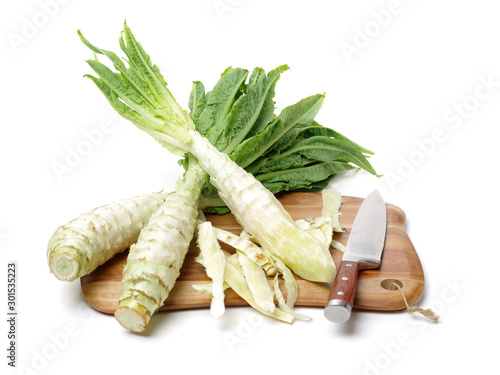 Asparagus lettuce on white background  photo