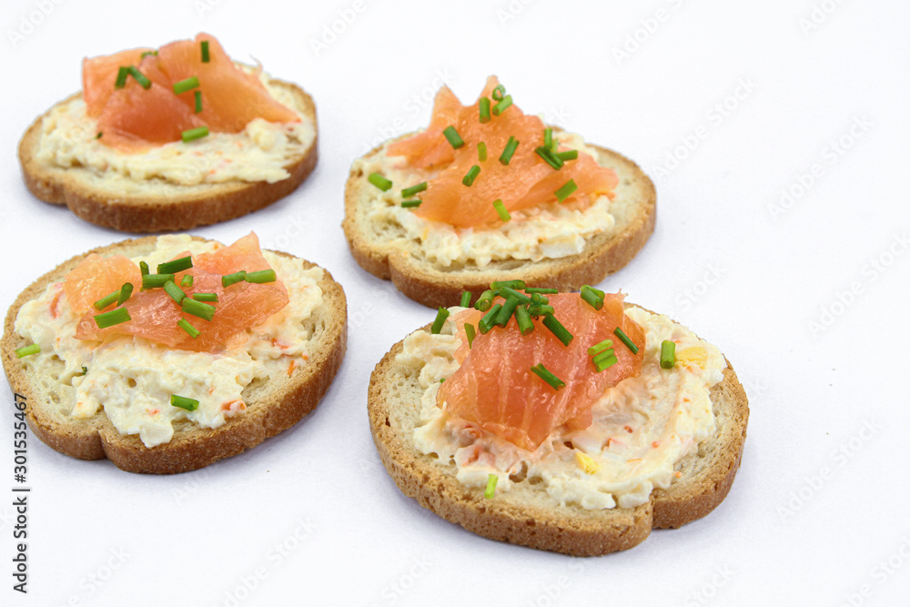 toast with smoked salmon on a white background