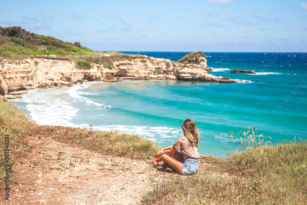 woman alone looking at the sea woman alone looking at the sea