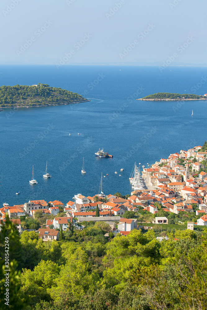 Aerial view on town and Adriatic Sea, typical Mediterranean architecture, Vis, Croatia