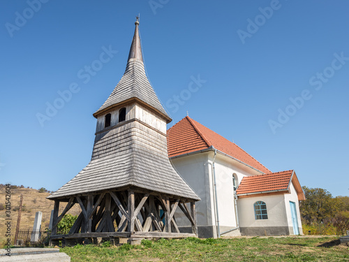 Wooden bell tower of a church outside a village in Transylvania, eastern Europe