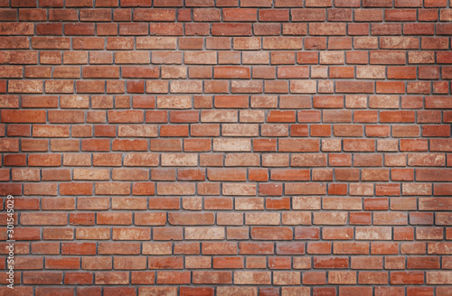 Vászonkép Red brick wall with vignette texture background
