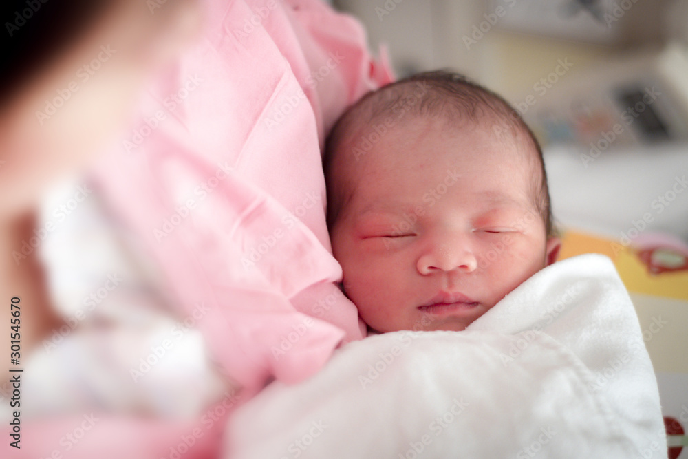 Close up and selective focus of one day old baby Close up and selective focus of one day old baby