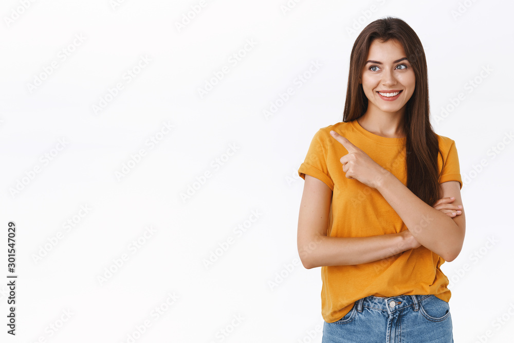 Satisfied, determined good-looking girlfriend know exactly what buy boyfriend b-day, present, pointing upper left corner, asking shop assistant bring that, smiling pleased, standing white background Satisfied, determined good-looking girlfriend know exactly what buy boyfriend b-day, present, pointing upper left corner, asking shop assistant bring that, smiling pleased, standing white background
