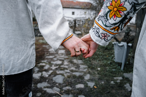  boyfriend and girlfriend are holding hands