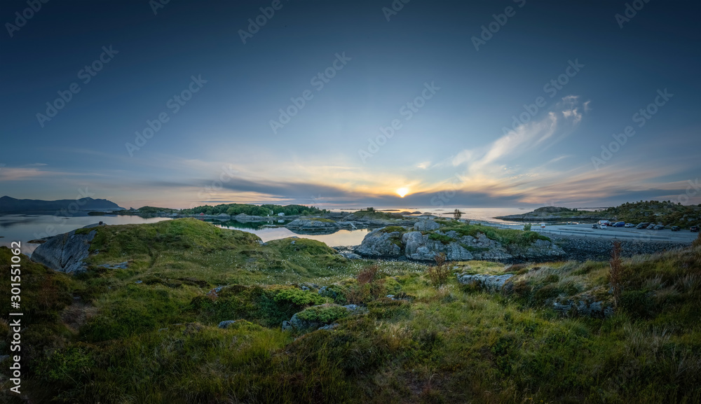 Atlantic road at sunset with big clouds panorama landscape