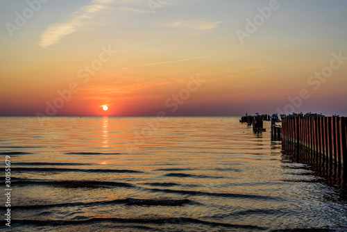 Beautiful sunset on the sea. Baltic sea at sunset  Narva-Joesuu  Estonia. Narva-Joesuu - seaside resort and popular holiday destination in Estonia