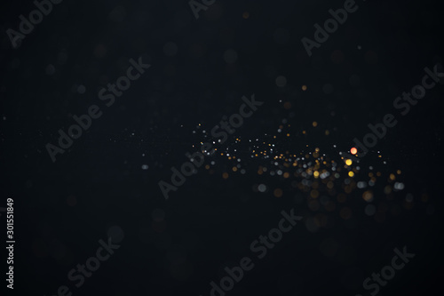 glitter vintage lights background. gold, silver, abstract lights luxury bokeh background. defocused