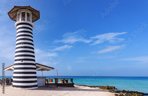 striped lighthouse on the caribbean