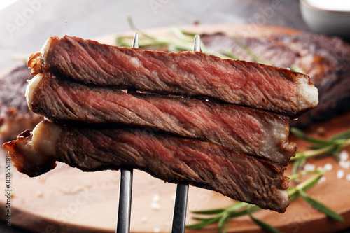 Barbecue Rib Eye Steak or rump steak - Dry Aged Wagyu barbecue Entrecote Steak photo