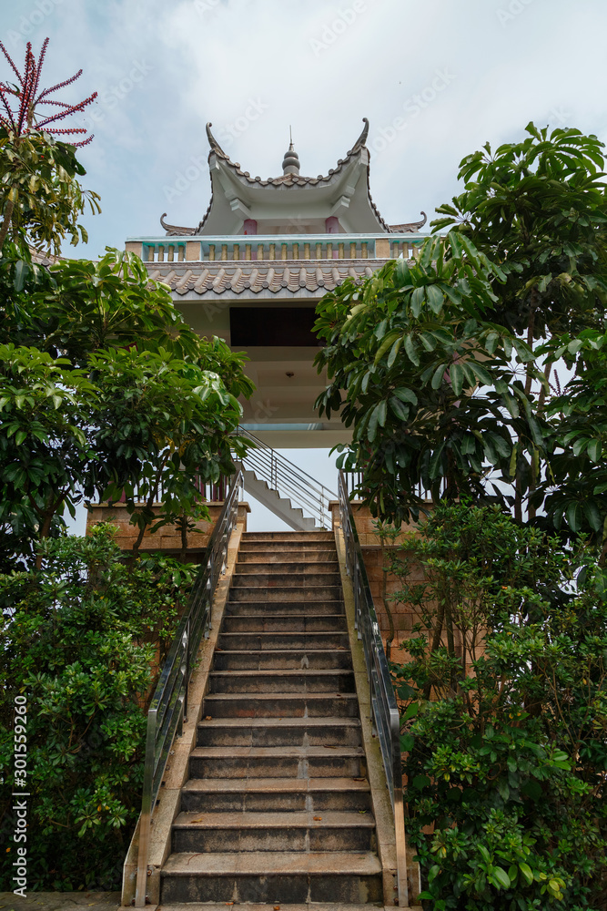 Obraz premium Stone staircase leading to the pagoda