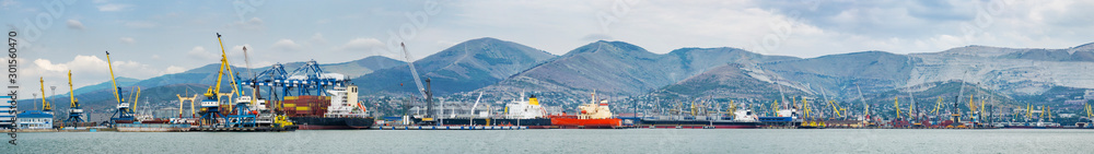 Sea, commercial, industrial port in the highlands, panorama