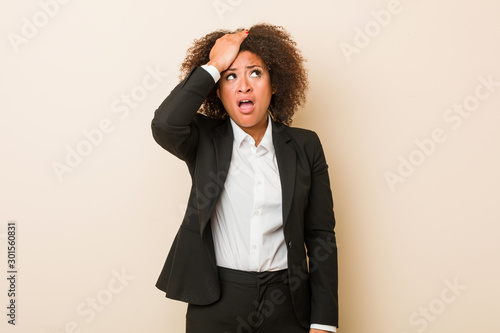 Tableau sur toile Young business african american woman being shocked, she has remembered important meeting