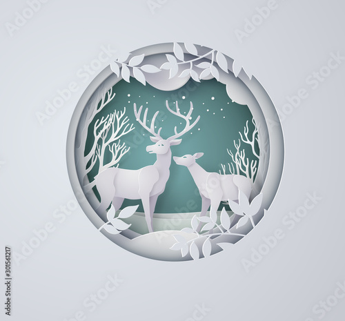 Deer in forest with snow in the winter season and christmas.vector paper art style.